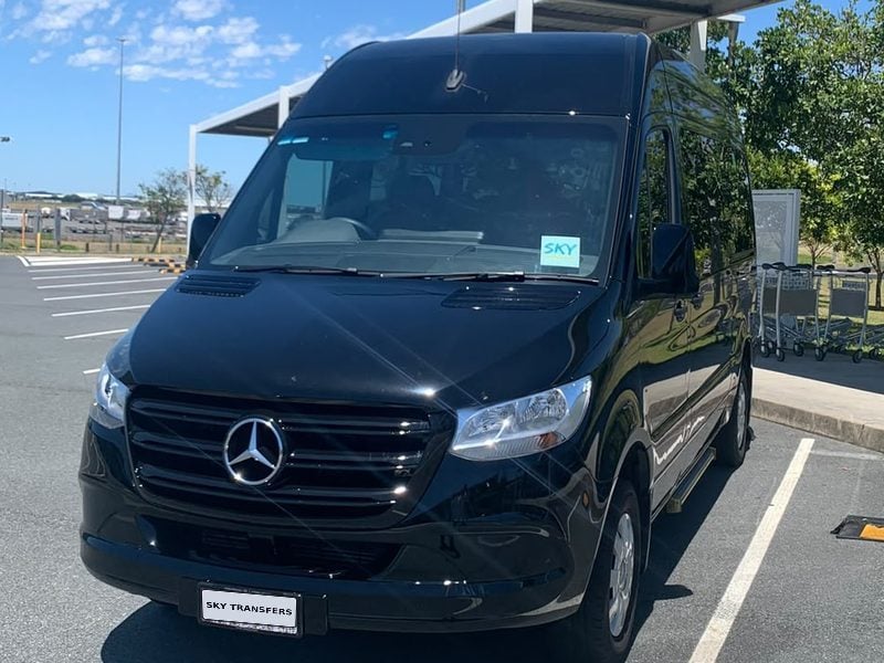 One of our Mercedes-Benz Sprinters waiting in an airport car park.